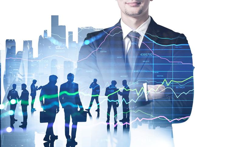 Businesspeople working and researching the analytics to predict stock market behaviour. CE